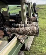 Photographic safari vehicle designed for long lenses and wildlife photography